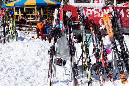 Bulgaria. Bansko. 12 February 2020.Bansko ski station, Kolarski ski lift at Banderishka polyana, skiers on ski slopes, mountain. With pine trees, people. Snowのeditorial素材