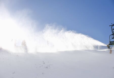 machine for the production of artificial snow in the mountains of skiing in Bulgariaの写真素材