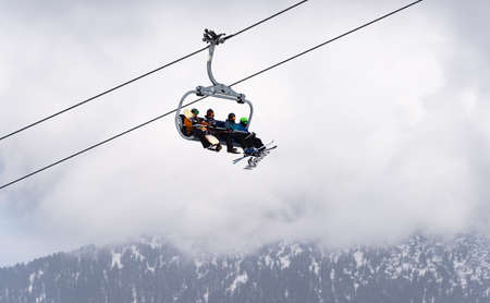 Bulgaria. Bansko. 10 February 2020.Ski resort in Bansko. Snowy ski slopes and  chair ski lifts station in  winter mountain ski resort. Under blue sky on sunny dayのeditorial素材