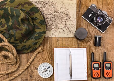 planning travel on vacation along with a map, compass, camera, notepad.の写真素材