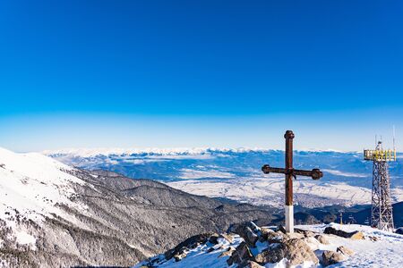 wooden christian cross on top of the mountain commemorative symbolの写真素材