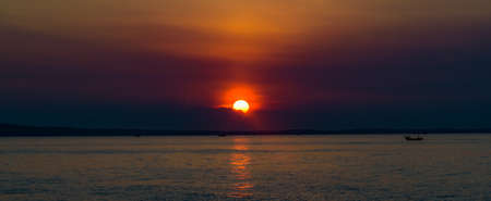 beautiful calm color sunset of the Caribbean in fine weatherの写真素材