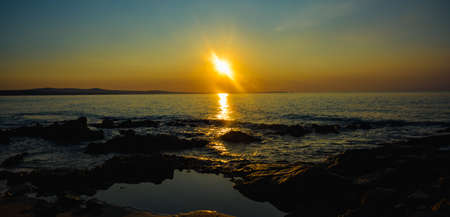 beautiful calm color sunset of the Caribbean in fine weatherの写真素材