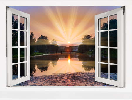 tropical landscape view from an open window to the sea sunsetの写真素材