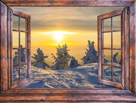 winter landscape view from the window is covered with ice frostの写真素材