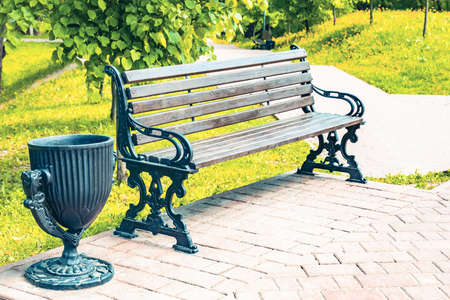 wooden bench for relaxing in the park in summerの写真素材
