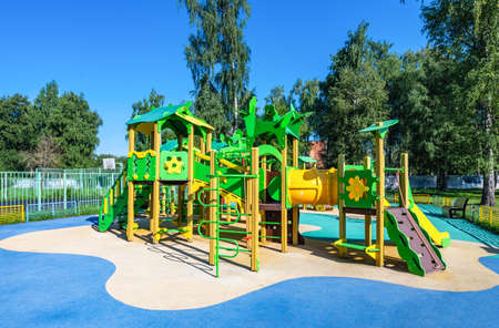 swing carousel in the park for children outdoors in summerの写真素材