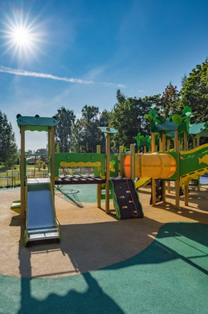 swing carousel in the park for children outdoors in summer
