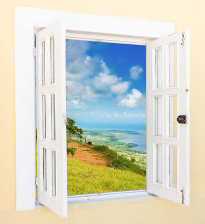 old wooden open window overlooking the tropicsの写真素材