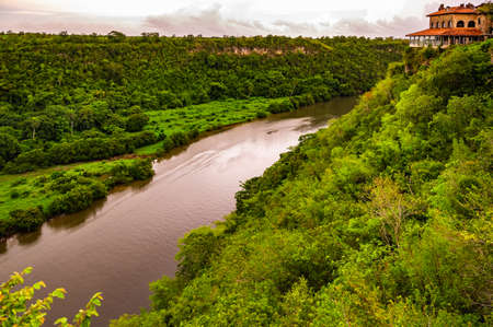 calm beautiful river chevon among tropical jungle high bank dominican republicの写真素材