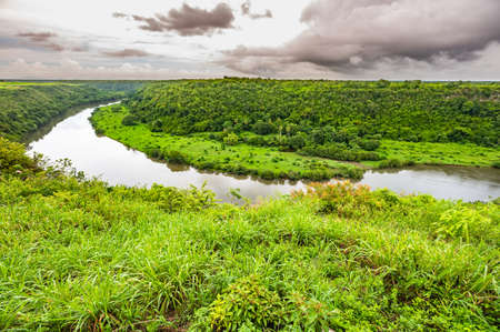calm beautiful river chevon among tropical jungle high bank dominican republicの写真素材