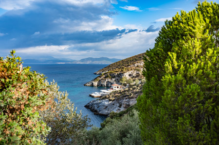 landscape rocky coast of the Aegean sea with green vegetationの写真素材