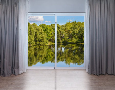 view from the window in the body of water and the tree in summer