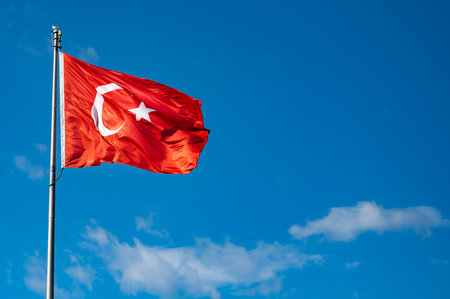 Homes along and turkish flag the Kusadasi Turkeyの写真素材