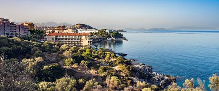 landscape rocky coast of the Aegean sea with green vegetationの写真素材