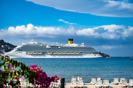 09/27/2022 Turkey, Kusadasi.sea cruise liner moored in the port of the cityのeditorial素材