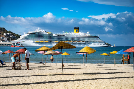 09/27/2022 Turkey, Kusadasi.sea cruise liner moored in the port of the cityのeditorial素材