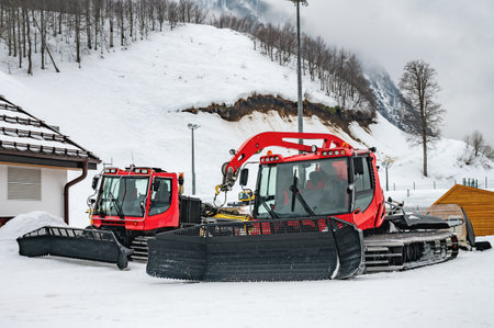 snowcat transport preparation ski slope on the hillsideの写真素材