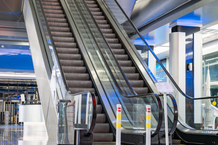 escalator in Pavilion shopping center in the room with glassの写真素材