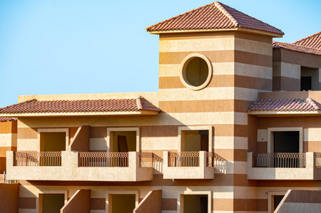 chimney on the roof of the house against the blue skyの写真素材
