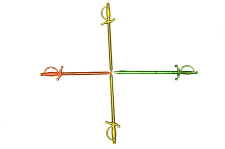 Four plastic swords isolated on whiteの写真素材