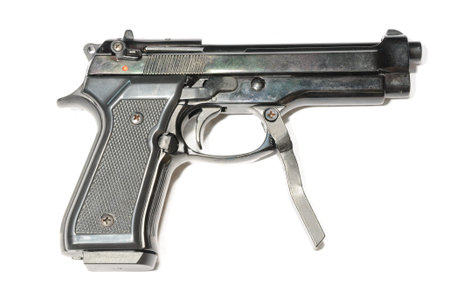 Small pistol with handle in front of the trigger isolated on white