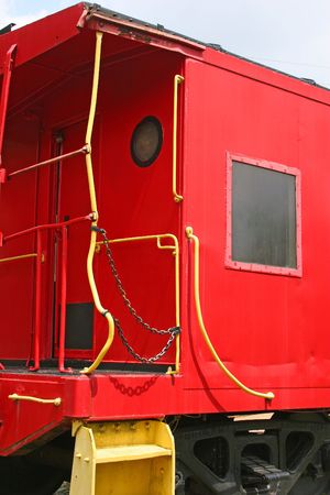 Red caboose on railroad trackの写真素材