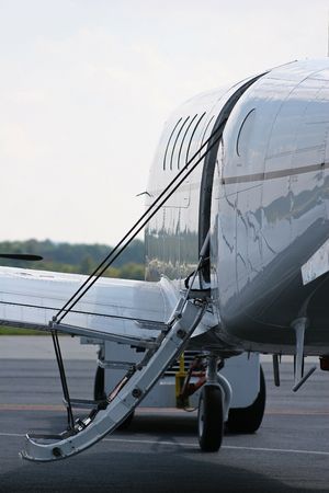 Boarding ladder on private jet sitting on runwayの写真素材