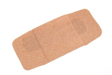 A Large plastic bandage isolated on whiteの写真素材