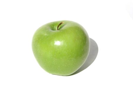 Single green apple isolated on white backgroundの写真素材
