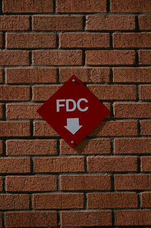 Fire Department Control sign on brick wallの写真素材