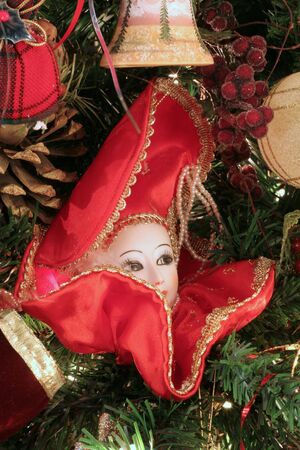 An antique Chrismas ornament hanging on a treeの写真素材