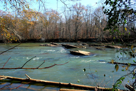 Rocky shoals in winter during the winterの写真素材