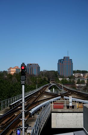 Rapid transit rail tracks running above ground from stationの写真素材