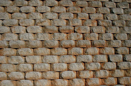 Close up of a retaining wall made of interlocking blocksの写真素材