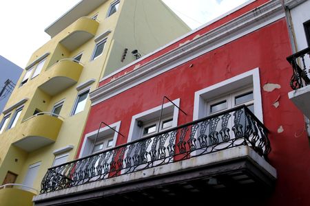 Red and yellow buildings in an old world townの写真素材