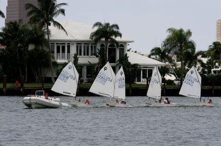 Five sailboats tacking in a intracoastal canalの写真素材