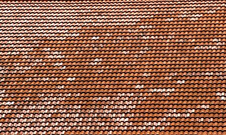 Red clay roof tiles good for a backgroundの写真素材