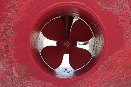 Close up of A red propeller on a red boatの写真素材