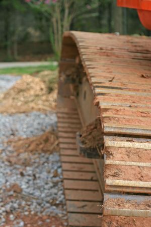 A steel track on the side of heavy construction equipmentの写真素材