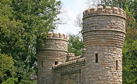Stone gates and turrets on an old castleの写真素材