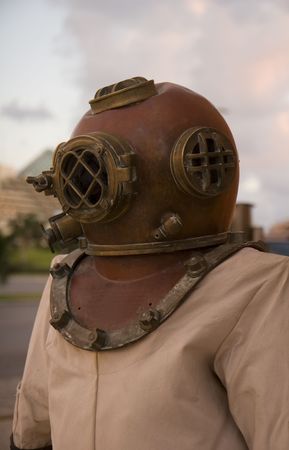 A diving suit with helmet in an outdoor settingの写真素材