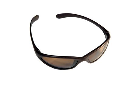 A pair of curved dark sunglasses isolated on a white backgroundの写真素材