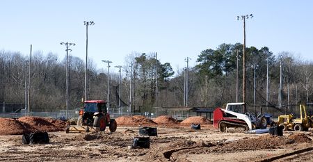 Heavy construction equipment in the process of building a new baseball fieldの写真素材