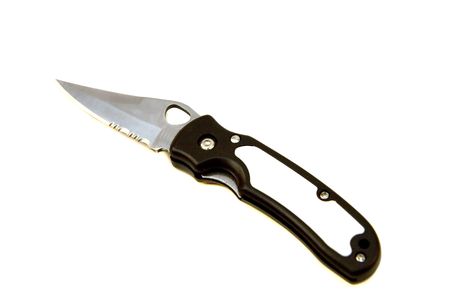 A sharp folding knife on a white backgroundの写真素材