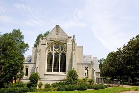 An old stone church with stained glass windowsの写真素材