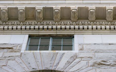 Intricate detail carved in granite on an old courthouseの写真素材