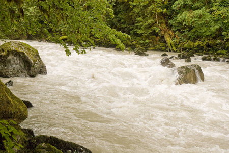 A mountain stream rushing through the rocks 