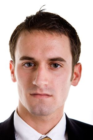 A closeup of  a young man in a suit with a serious expressionの写真素材