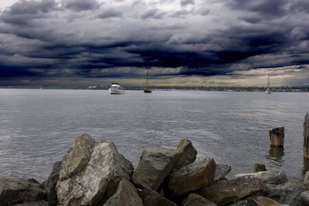 A protected harbor under dark threatening skiesの写真素材